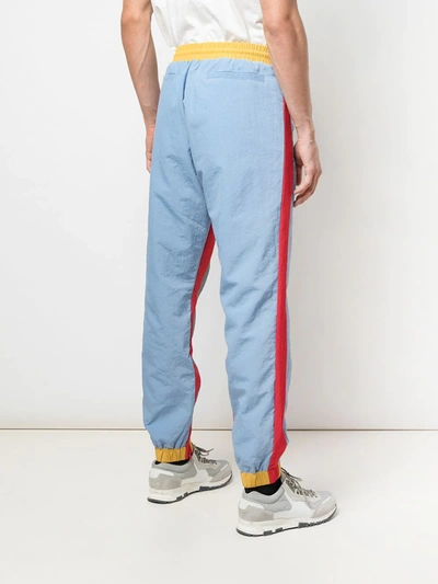 Shop God's Masterful Children Striped Track Trousers In Blue