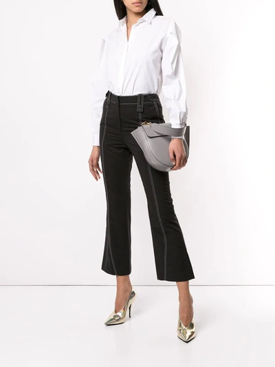 Shop Givenchy Stitch Detail Kick Flared Trousers In Black