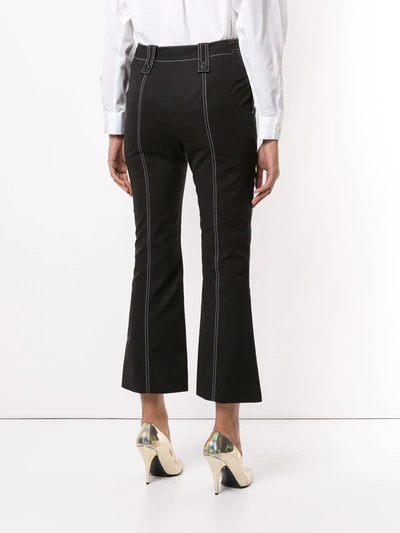 Shop Givenchy Stitch Detail Kick Flared Trousers In Black