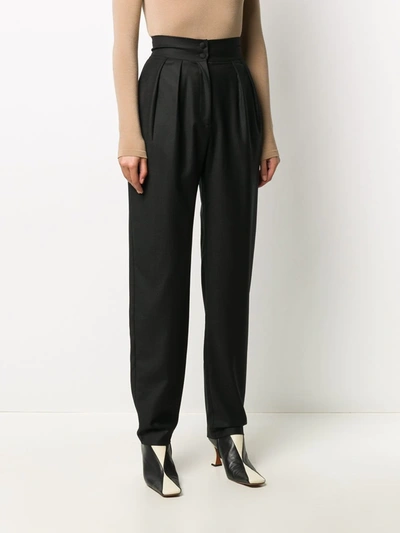 Shop Materiel Tapered-leg Wool Trousers In Black