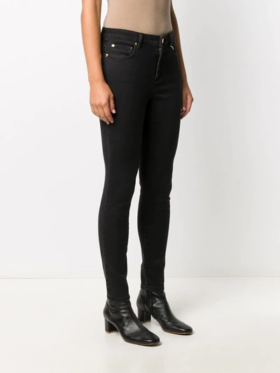 Shop Michael Michael Kors Mid-rise Skinny Jeans In Black