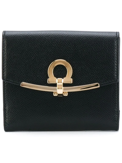 Shop Ferragamo Fold-over Clasp Purse In Black