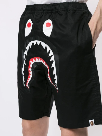 Shop A Bathing Ape Graphic Print Track Shorts In Black