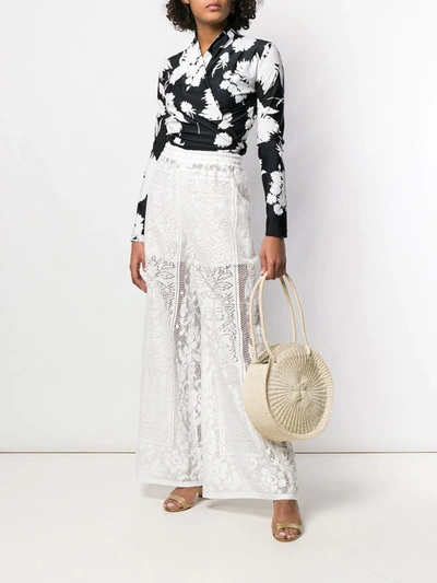 Shop Dolce & Gabbana Crochet Palazzo Pants In White