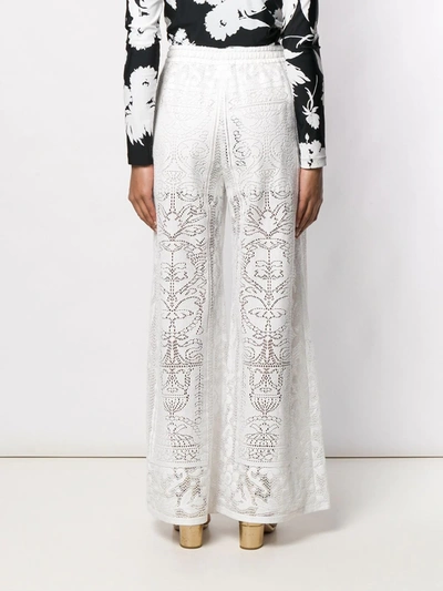 Shop Dolce & Gabbana Crochet Palazzo Pants In White