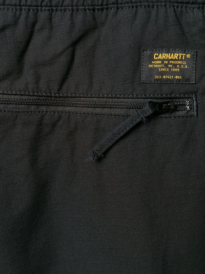 Shop Carhartt Cargo Jogging Trousers In Black