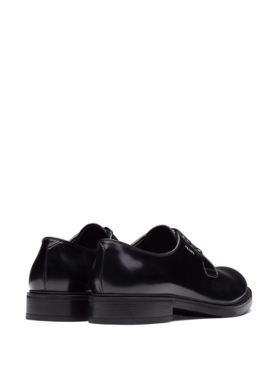 Shop Prada Brushed-leather Derby Shoes In Black