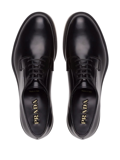 Shop Prada Brushed-leather Derby Shoes In Black