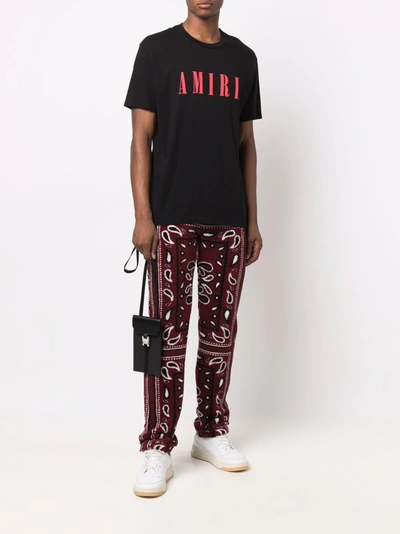 Shop Amiri Bandana-print Track Pants In 红色