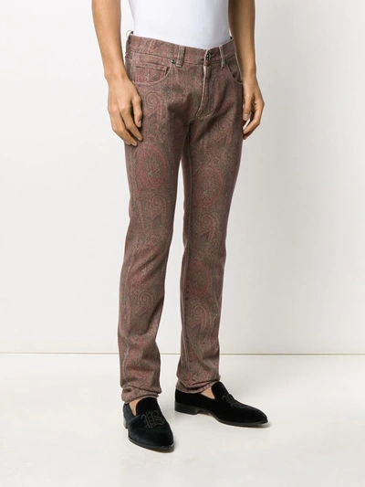 Shop Etro Paisley Printed Bootcut Jeans In Brown