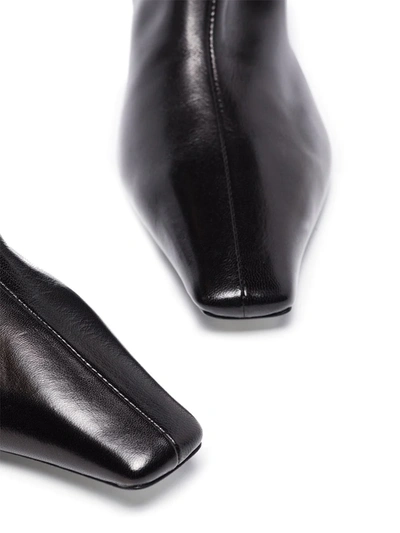 Khaite Davis Slouchy Leather Knee Boots In Black