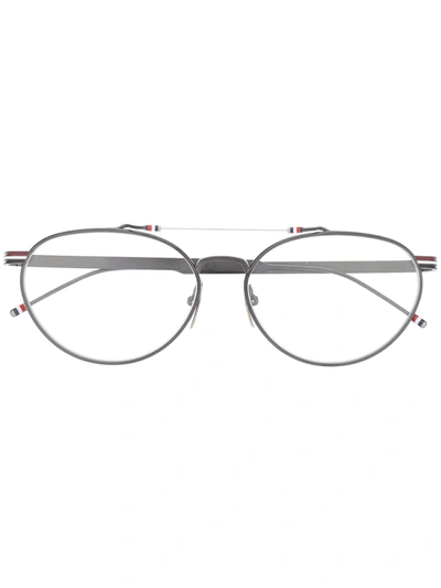 Shop Thom Browne Oval Frame Glasses In Grey