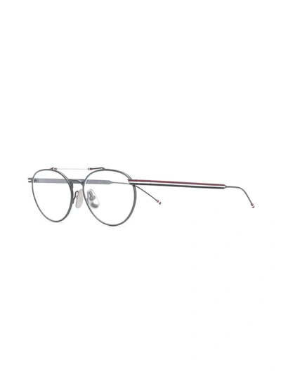 Shop Thom Browne Oval Frame Glasses In Grey