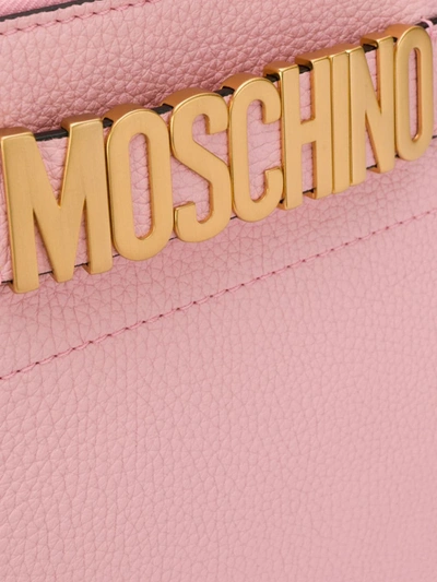 Shop Moschino Logo Clutch In Pink