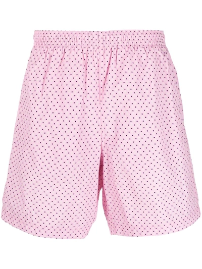 Shop Alexander Mcqueen Skull-print Slip-on Swim Shorts In Rosa