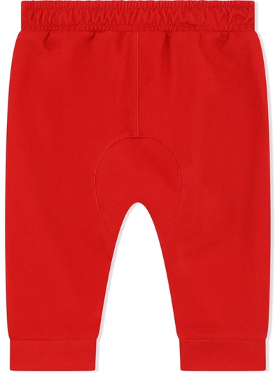 Shop Dolce & Gabbana Leopard Leg Trousers In Red