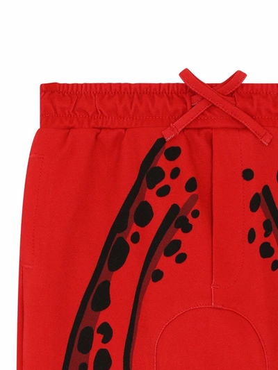 Shop Dolce & Gabbana Leopard Leg Trousers In Red