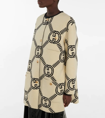 Shop Gucci Interlocking G Reversible Wool Cardigan In Almond/black