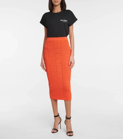 Shop Balmain Monogram Jacquard Midi Skirt In Orange Fonce
