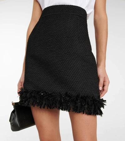 Shop Dolce & Gabbana Fringe-trimmed Bouclé Miniskirt In Nero