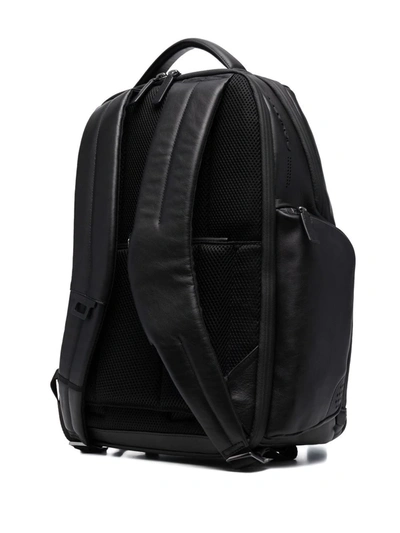 Shop Piquadro Logo-embossed Backpack In Black