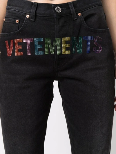 Shop Vetements Studded-logo Straight-leg Jeans In Black