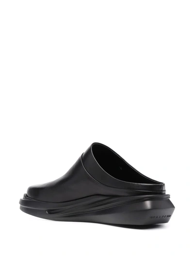 Shop Alyx Mono Leather Mules In Black