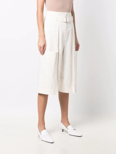 Shop Lemaire Belted Capri Shorts In White
