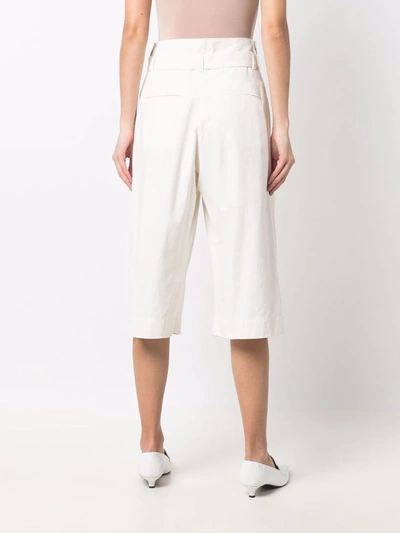 Shop Lemaire Belted Capri Shorts In White
