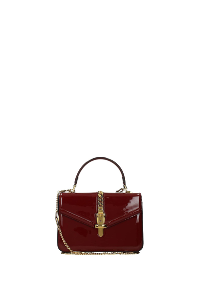 Shop Gucci Handbags Sylvie 1969 Patent Leather Dark In Red