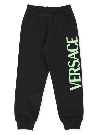 Shop Versace Cotton Pants In Nero+verde