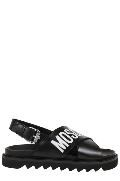 Shop Moschino Logo Print Cross Sandals In Black
