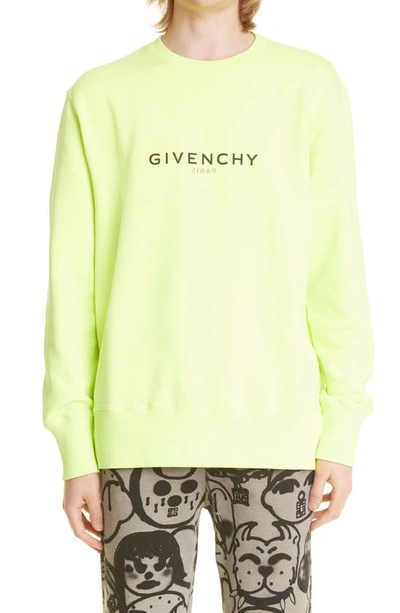 Shop Givenchy Reverse Print Oversize Crewneck Sweatshirt In 734 - Fluo Yellow
