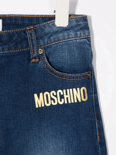 Shop Moschino Logo-print Straight-leg Denim Jeans In Blue