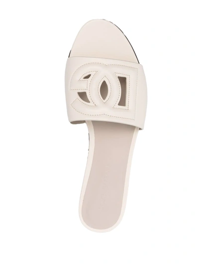 Shop Dolce & Gabbana Logo Lettering Flat Mules In Nude
