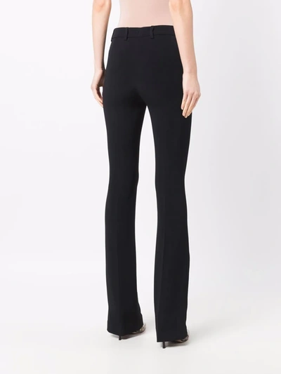 Shop Roberto Cavalli Slim-leg Flared Trousers In Black