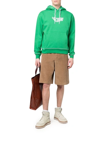 Shop Jacquemus Wave Logo-print Organic-cotton Hoodie In Green