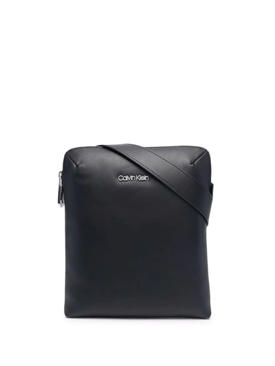 Shop Calvin Klein Logo-plaque Messenger Bag In Black