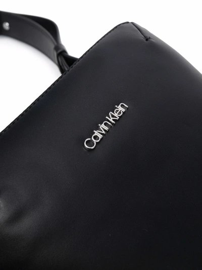 Shop Calvin Klein Logo-plaque Messenger Bag In Black