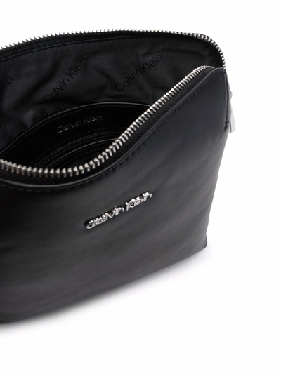 Shop Calvin Klein Logo-plaque Messenger Bag In Black