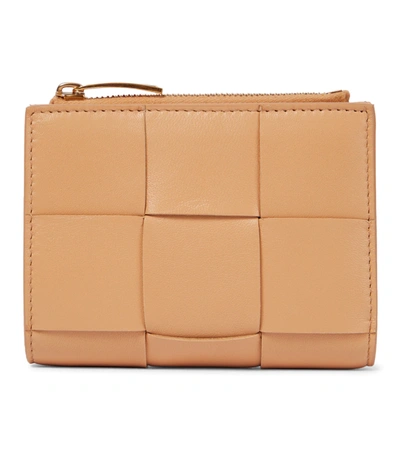 Shop Bottega Veneta Bi-fold Leather Wallet In Almond-gold