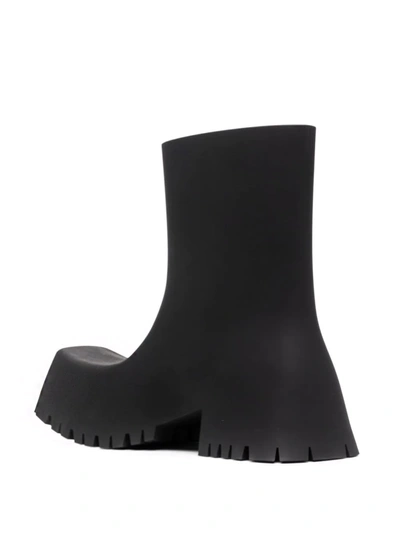 Shop Balenciaga Trooper Rubber Low Boots In Black