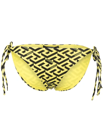 Shop Versace Greca Signature-print Bikini Bottoms In Yellow