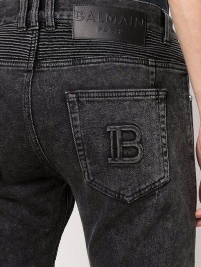 Shop Balmain Debossed-logo Detail Jeans In Black