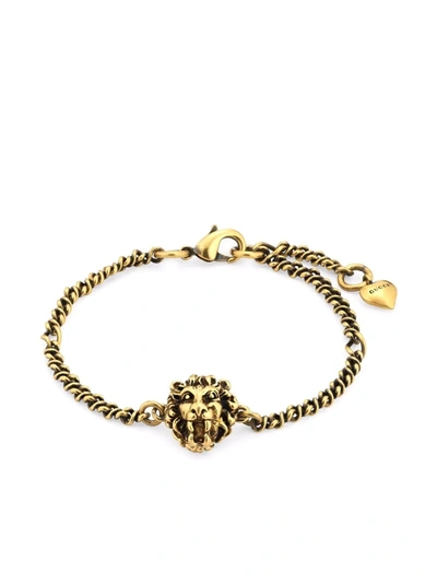 Shop Gucci Lion Head Bracelet In Gold