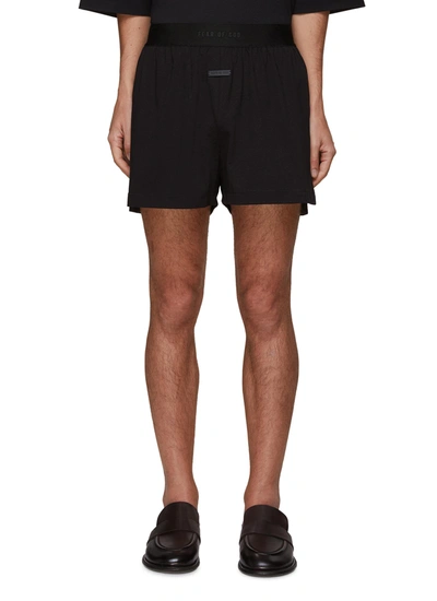 Shop Fear Of God Relaxed Fit Elastic Waist Logo Jacquard Shorts In Black