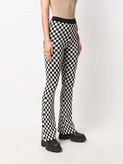 BAUM UND PFERDGARTEN CARAMBA CHECKED FLARED-LEG TROUSERS 