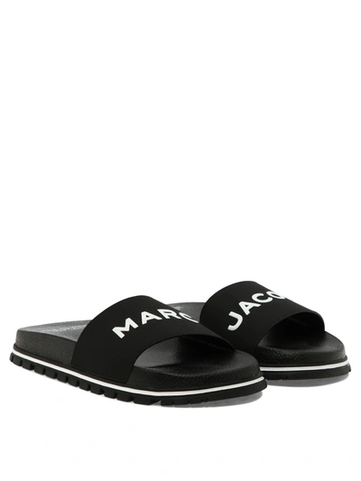 Shop Marc Jacobs Embossed Logo Sandals In Black  