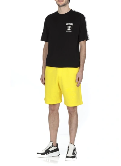 Shop Moschino Shorts Yellow