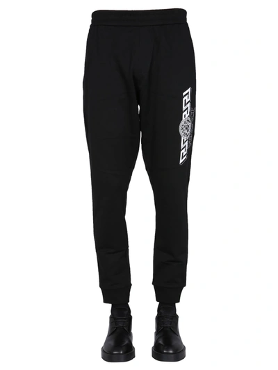 Shop Versace Jogging Pants With Greek Print In Black
